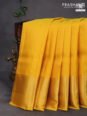 Pure kanchipuram silk saree mustard yellow and pink with allover zari checked pattern and zari woven border