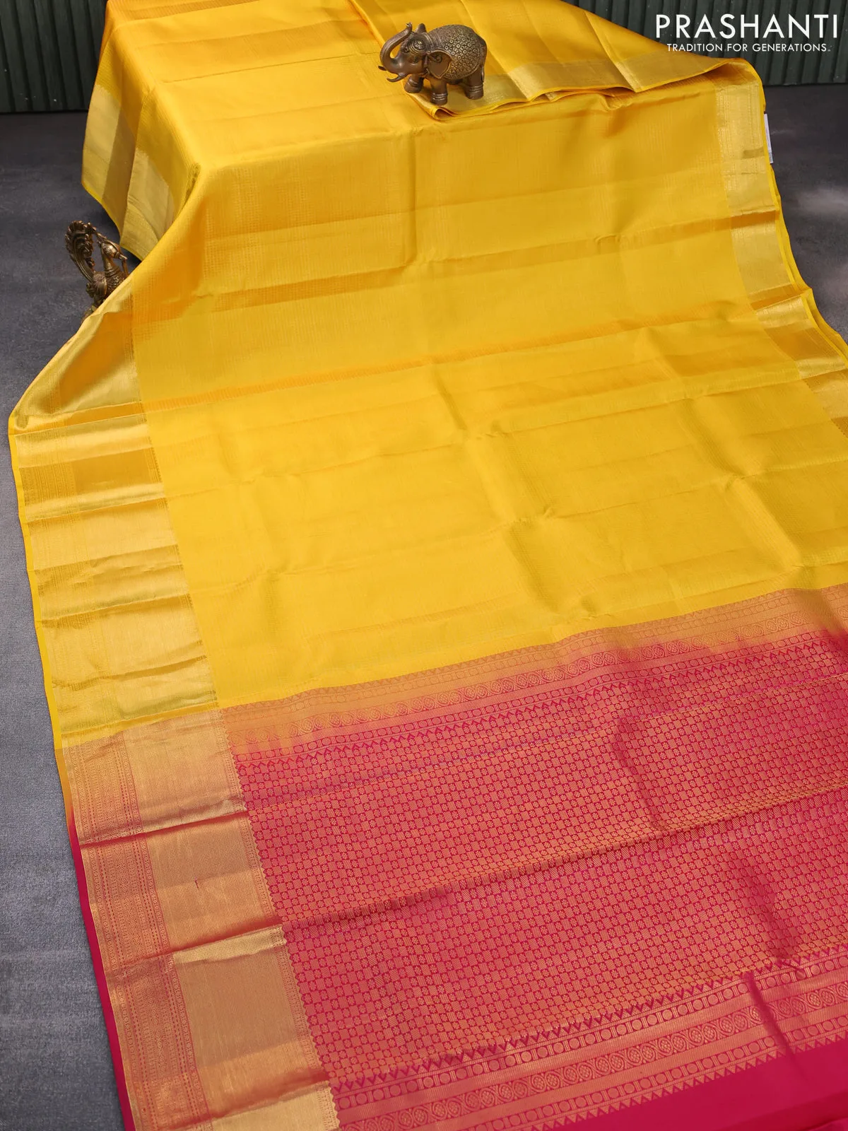 Pure kanchipuram silk saree mustard yellow and pink with allover zari checked pattern and zari woven border